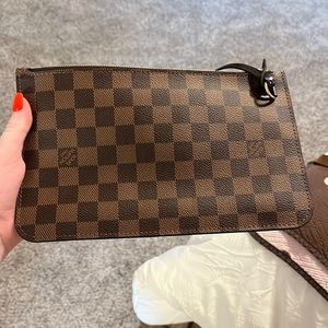 Never full pochette Cherry red interior brown canvas wristlet